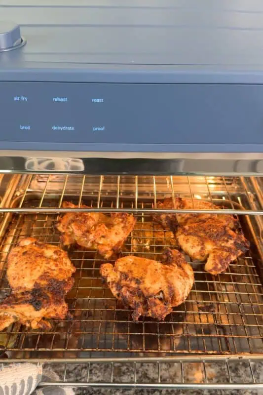 Chicken thighs in air fryer right after cooking.