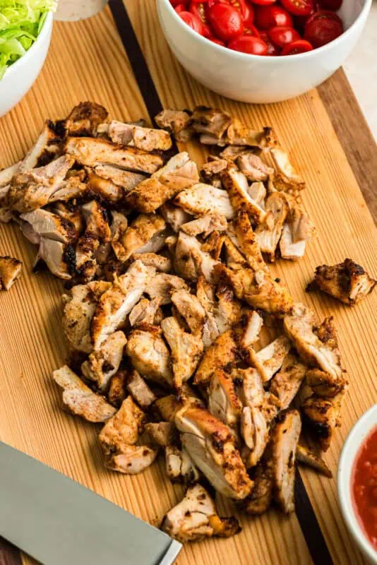 Taco chicken thighs cut into thin pieces.