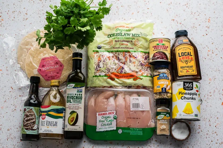 Ingredients to make pineapple chipotle chicken tacos.