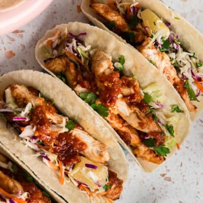 Three chipotle chicken tacos.