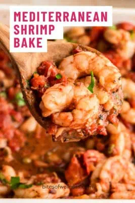 Large spoon filled with Mediterranean shrimip.