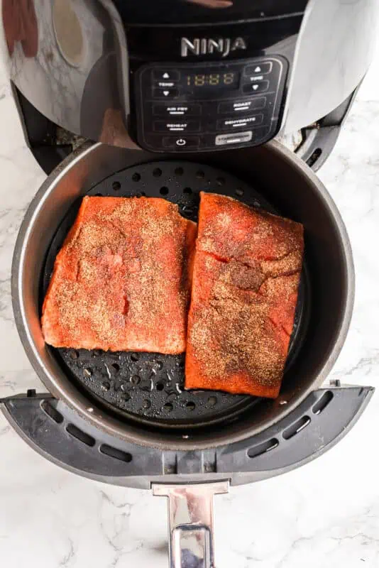 Blackened salmon in air fryer before cooking