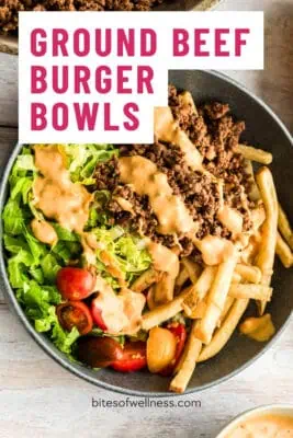 Bowl filled with ground beef, fries, lettuce, tomato and special sauce.
