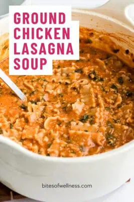 Large pot of chicken lasagna soup with spoon resting in pot.