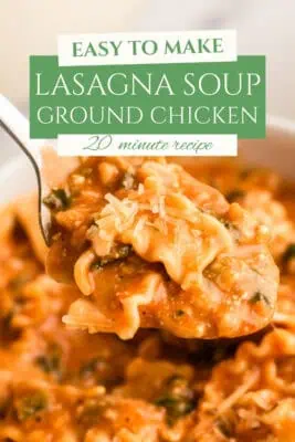 Spoonful of lasagna soup being lifted from the pot.