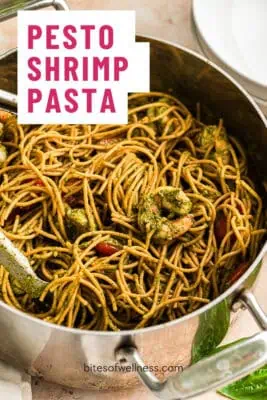 Pesto shrimp pasta with tomatoes in a skillet, ready in 15 minutes. Perfect quick dinner recipe with.