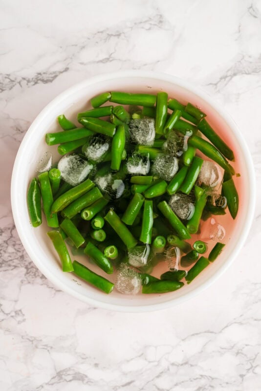 Green beans in ice bath.